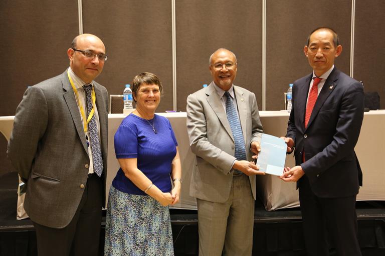 #04 Dr Kasai hands over HiT Report to Health Minister Sir Dr Temu during the launch of HiT #04 Dr Kasai hands over HiT Report to Health Minister Sir Dr Temu during the launch of HiT
